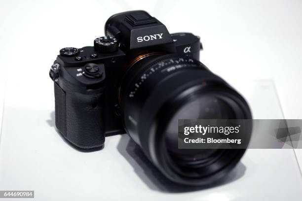 Sony Corp. Alpha 7R II full-frame mirrorless interchangeable lens digital camera sits on display for a photograph at the CP+ Camera and Photo Imaging...