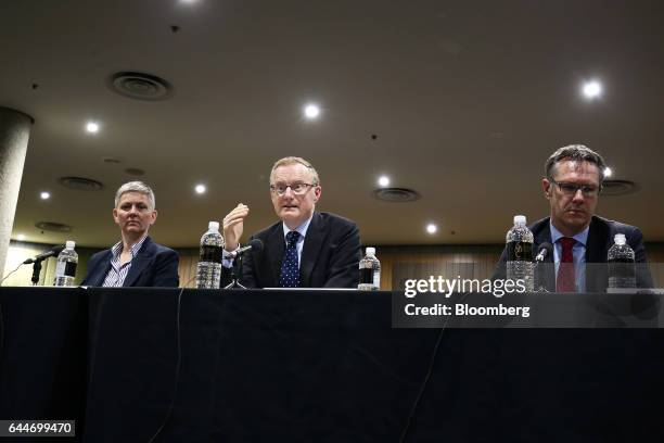 Philip Lowe, governor of the Reserve Bank of Australia, center, speaks as Luci Ellis, assistant governor, left, and Guy Debelle, deputy governor,...