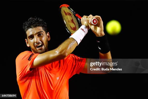 Thomaz Bellucci of Brazil returns a shot to Thiago Monteiro of Brazil during the ATP Rio Open 2017 at Jockey Club Brasileiro on February 23, 2017 in...