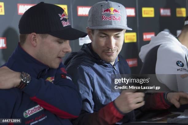 Nicky Hayden of USA and Red Bull Honda World Superbike team speaks with Stefan Bradl of Germany and Red Bull Honda World Superbike team during the...