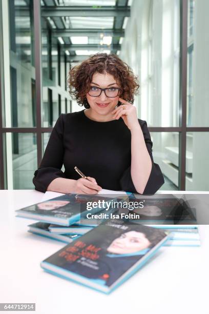 Author Nahid Shahalimi signs her book at Sofitel Munich Bayerpost on February 23, 2017 in Munich, Germany. Shahalimi's book 'Wo Mut die Seele Traegt:...