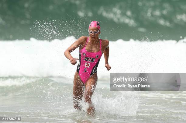 Lizzie Welborn competes during the swim leg during the Round One Enduro during the Nutri Grain IronMan and IronWoman Finals at Cronulla Beach on...