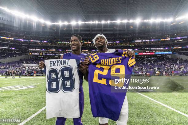 Dallas Cowboys wide receiver Dez Bryant exchanges his jersey with Minnesota Vikings defensive back Xavier Rhodes after a game between the Minnesota...