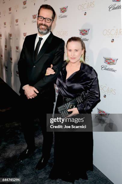 Artist Eric White and actor Patricia Arquette attend the Cadillac Oscar Week Celebration at Chateau Marmont on February 23, 2017 in Los Angeles,...