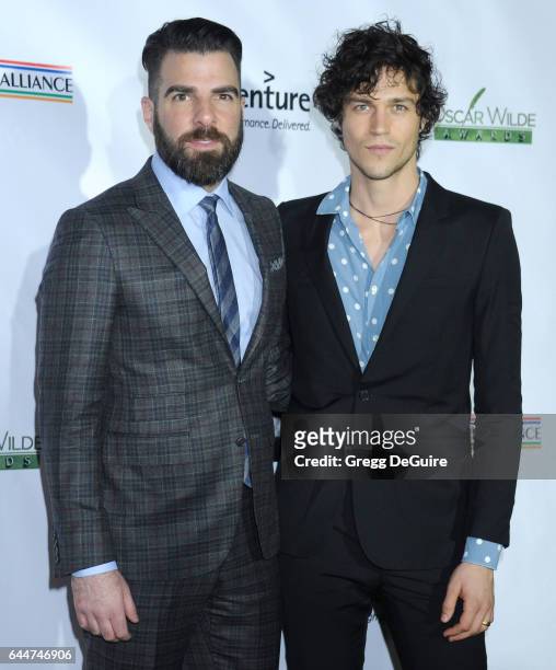 Actor Zachary Quinto and model Miles McMillan arrive at the 12th Annual Oscar Wilde Awards at Bad Robot on February 23, 2017 in Santa Monica,...