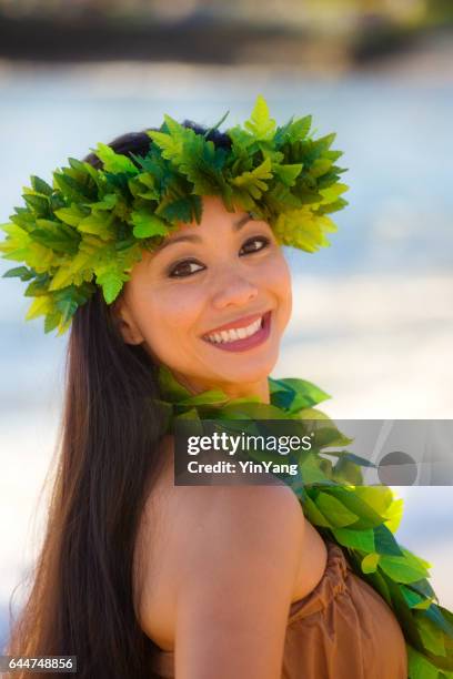 portrait of welcoming and smiling hawaiian hula dancer - hawaiian print dress stock pictures, royalty-free photos & images