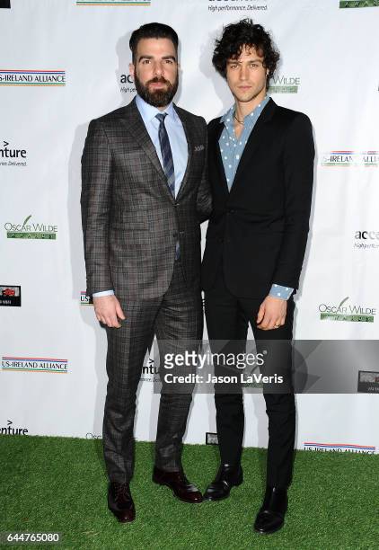 Actor Zachary Quinto and Miles McMillan attend the 12th annual Oscar Wilde Awards at Bad Robot on February 23, 2017 in Santa Monica, California.