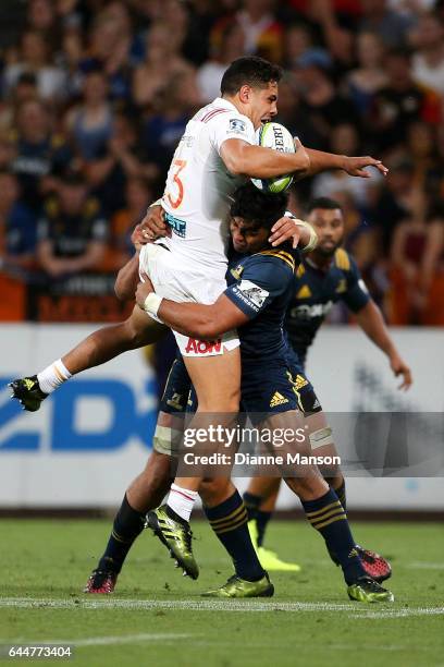 Anton Leinert Brown of the Chiefs in the tackle of Malakai Fekitoa of the Highlanders during the round one Super Rugby match between the Highlanders...