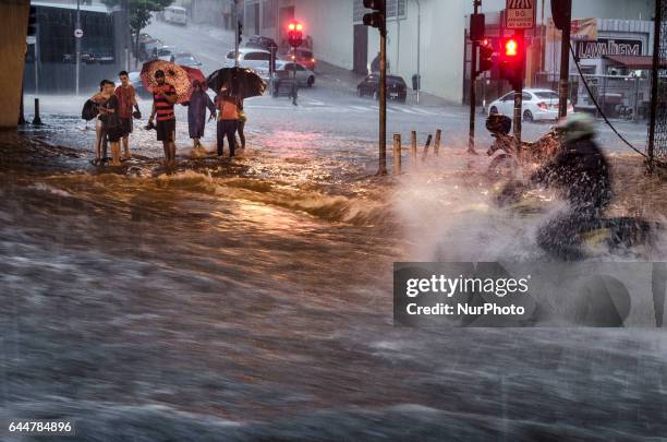 Heavy storm, with hail rain on some periods and strong winds cause floods in downtown Sao Paulo, transforming hillside roads into waterfalls, and the...