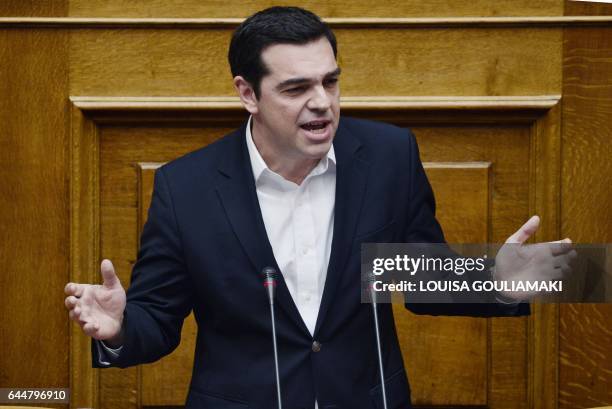 Greek Prime Minister Alexis Tsipras answers questions on the results of the latest Eurogroup meeting at the Greek parliament in Athens on February...