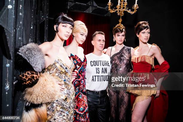 Bella Hadid, Gigi Hadid, Jeremy Scott a model and Anna Cleveland are seen backstage ahead of the Moschino show during Milan Fashion Week Fall/Winter...
