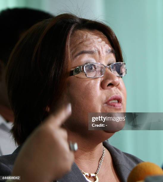 Justice Secretary Leila De Lima, head of the probe body tasked to investigate the botched bus hostage rescue operation on August 23, talks to media...