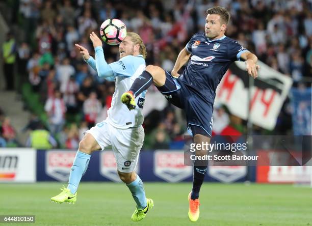 Milos Dimitrijevic of Sydney FC and Luke Brattan of City compete for the ball during the round 21 A-League match between Melbourne City and Sydney FC...