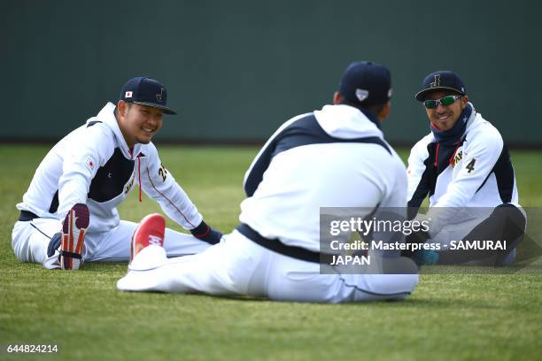 Yoshitomo Tsutsugo and Ryosuke Kikuchi of Japan smiles during SAMURAI JAPAN's training camp at the Sun Marine Stadium Miyazaki on February 24, 2017...