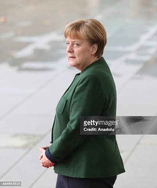 German Chancellor Angela Merkel waits to welcome European Parliament President Antonio Tajani ahead of their meeting at the German Chancellery in...