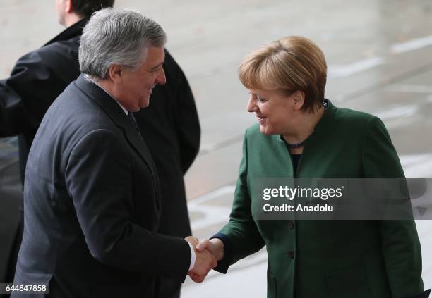 German Chancellor Angela Merkel welcomes European Parliament President Antonio Tajani ahead of their meeting at the German Chancellery in Berlin,...