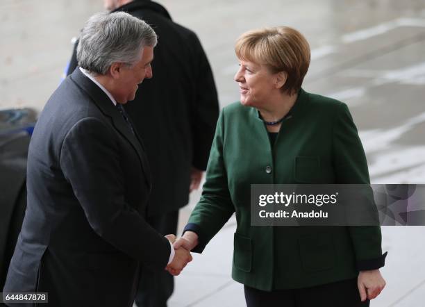 German Chancellor Angela Merkel welcomes European Parliament President Antonio Tajani ahead of their meeting at the German Chancellery in Berlin,...