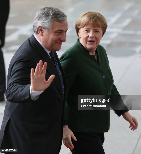 German Chancellor Angela Merkel welcomes European Parliament President Antonio Tajani ahead of their meeting at the German Chancellery in Berlin,...