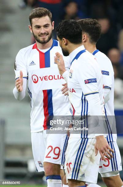 Nabil Fekir of Lyon celebrates his third goal with Lucas Tousart during the UEFA Europa League Round of 32 second leg match between Olympique...