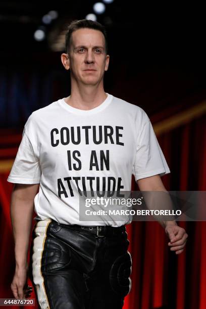 Designer Jeremy Scott greets the audience at the end of the show for fashion house Moschino during the Women's Fall/Winter 2017/2018 fashion week in...