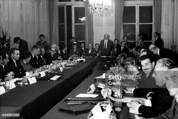 French Prime Minister Georges Pompidou , members of the government and French union's representatives attend a meeting of the Grenelle agreements...