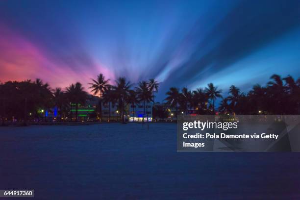 sunset ocean drive scene at south beach, miami, usa. - boulevard strand stock pictures, royalty-free photos & images