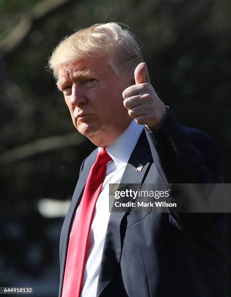 President Donald Trump gestures as he walks toward Marine One before departing from the White House on February 24, 2017 in Washington, DC. President...