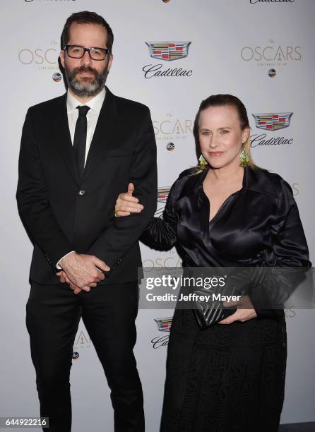 Artist Eric White and actress Patricia Arquette attend Cadillac's 89th annual Academy Awards celebration at Chateau Marmont on February 23, 2017 in...