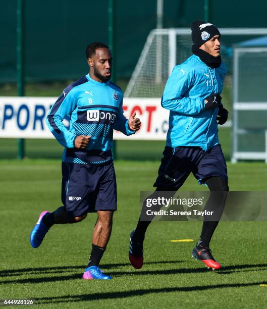 Vurnon Anita and Yoan Gouffran warm up during the Newcastle United Training Session at The Newcastle United Training Centre on February 24, 2017 in...