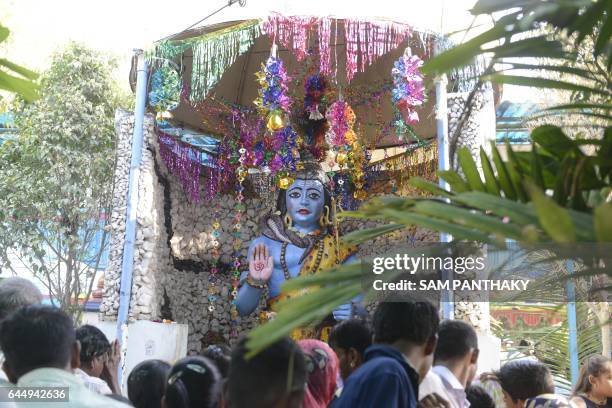 Indian Hindu devotees visit the Somnath Mahadev to mark Maha Shivratri at Shahwadi village on the outskirts of Ahmedabad on February 24, 2017. The...