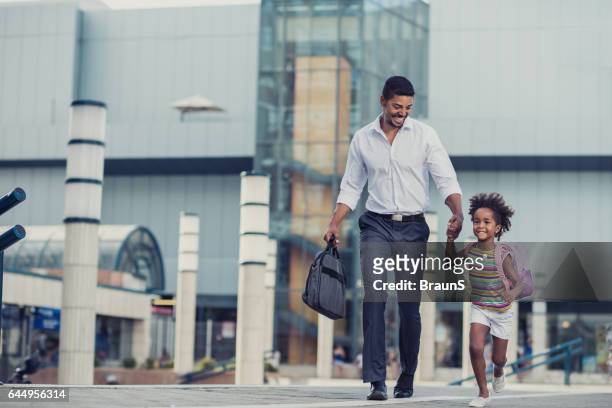 hurry up baby, we are going late to school! - moving activity stock pictures, royalty-free photos & images