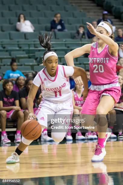 Cleveland State Vikings G Khayla Livingston is defended by Detroit Titans G Nicole Urbanick as she drives to the basket during the first quarter of...