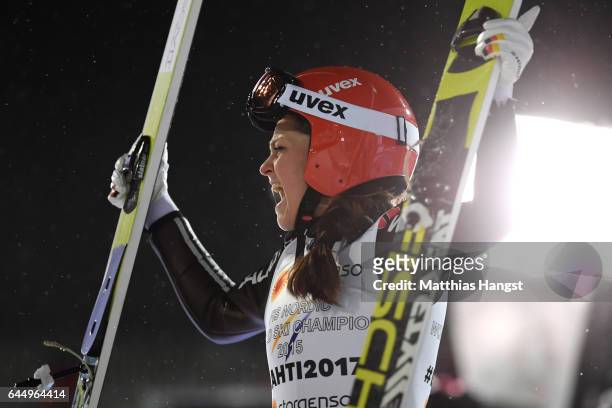 Carina Vogt of Germany reacts following her second jump in the Women's Ski Jumping HS100 during the FIS Nordic World Ski Championships on February...