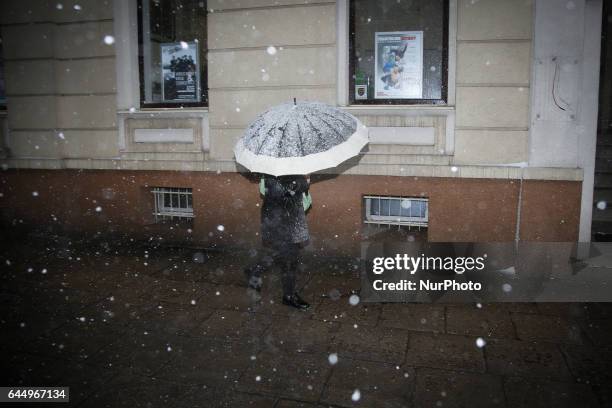 People are seen in the streets of Bydgoszcz, Poland during heavy snowfall on 24 February, 2017.