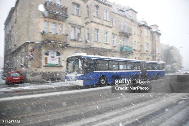 People are seen in the streets of Bydgoszcz, Poland during heavy snowfall on 24 February, 2017.