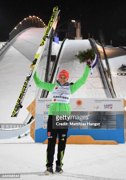 Gold medalist Carina Vogt of Germany celebrates following the Women's Ski Jumping HS100 during the FIS Nordic World Ski Championships on February 24,...