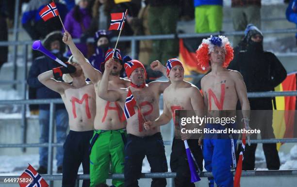 Norway fans cheer on Maren Lundby of Norway as she competes in the Women's Ski Jumping HS100 during the FIS Nordic World Ski Championships on...