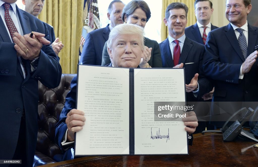 President Trump Signs Executive Order In Oval Office
