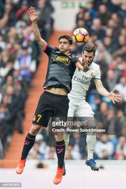Gerard Moreno Balaguero of RCD Espanyol fights for the ball with Nacho Fernandez of Real Madrid during the match Real Madrid vs RCD Espanyol, a La...
