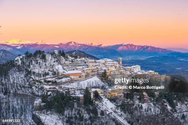 sacro monte at sunset in winter.  varese, italy. - varese stock-fotos und bilder