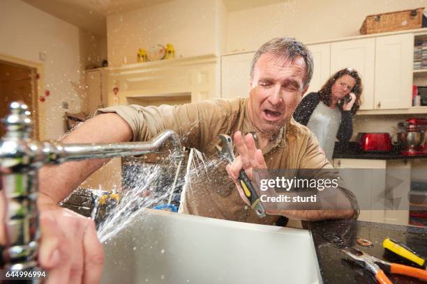 plumbing mishap - tap water stock pictures, royalty-free photos & images