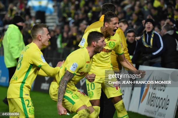 Nantes' Argentinian forward Emiliano Sala celebrates and Nantes' Moroccan forward Yacine Bammou celebrate after Sala scored a penalty during the...