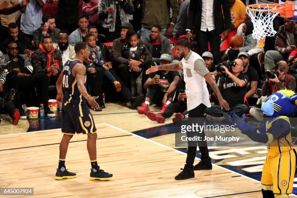Paul George celebrates with Glenn Robinson III of the Indiana Pacers after winning the Verizon Slam Dunk Contest during State Farm All-Star Saturday...