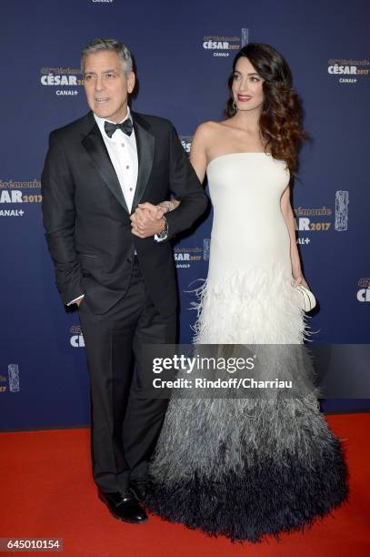 George Clooney and Amal Clooney arrive at the Cesar Film Awards Ceremony at Salle Pleyel on February 24, 2017 in Paris, France.