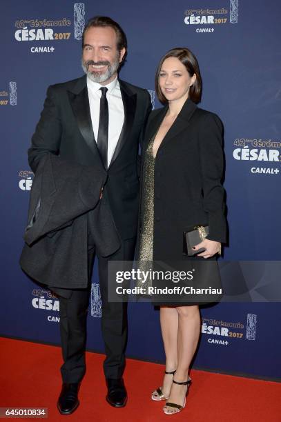 Jean Dujardin and Nathalie Pechalat arrive at the Cesar Film Awards Ceremony at Salle Pleyel on February 24, 2017 in Paris, France.