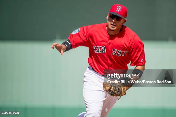 Allen Craig of the Boston Red Sox carries the ball to first base during the third inning of a game against the New York Mets on February 24, 2017 at...
