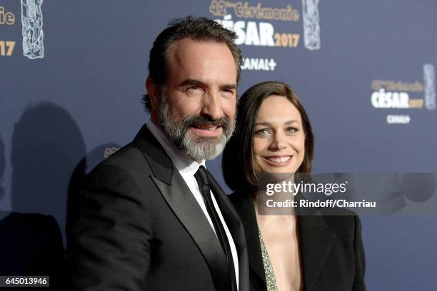 Jean Dujardin and Nathalie Pechalat arrive at the Cesar Film Awards Ceremony at Salle Pleyel on February 24, 2017 in Paris, France.