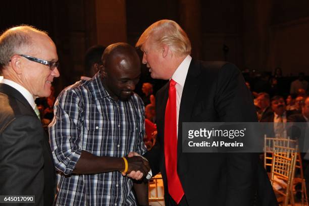 Donald Trump and Santonio Holmes attend the NY Jets kickoff luncheon party at Cipriani Wall Street on August 27, 2008 in New York.