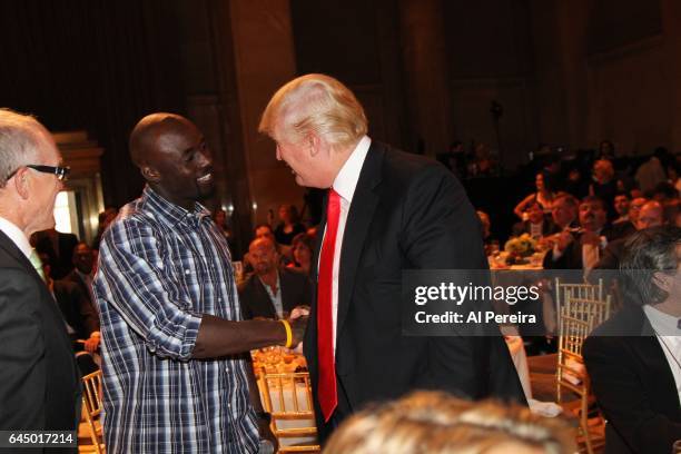 Donald Trump and Santonio Holmes attend the NY Jets kickoff luncheon party at Cipriani Wall Street on August 27, 2008 in New York.