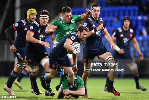 Leinster , Ireland - 24 February 2017; Arthur Retiere of France is tackled by Jonny Stewart of Ireland during the RBS U20 Six Nations Rugby...